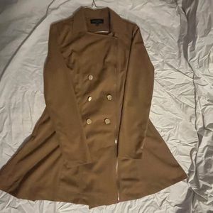 Tan jacket with gold accents